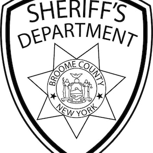 May include: Black and white illustration of a sheriff's badge with the text "SHERIFF'S DEPARTMENT" at the top and "BROOME COUNTY NEW YORK" at the bottom.