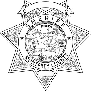 May include: Black and white illustration of a sheriff's badge with a star shape and the words "SHERIFF MONTEREY COUNTY" around the perimeter. The center of the badge features a seal with the words "EUREKA" and a scene of a woman standing on a mountain with a bear and a ship in the background.