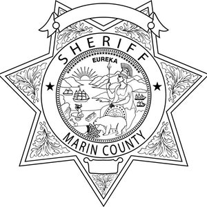 May include: Black and white illustration of a sheriff's badge with a star shape and the words "SHERIFF MARIN COUNTY" around a circle. The circle contains a seal with the words "EUREKA" and a woman holding a spear standing on a mountain.