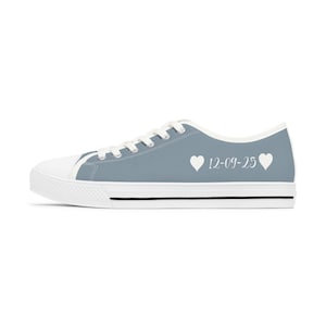 Dusty blue womens low top sneakers in a Converse style with white laces, soles, and custom text. Can be personalized with your name or text of your choice. These are ideal as bridal sneakers to match your wedding color, or your school colors.