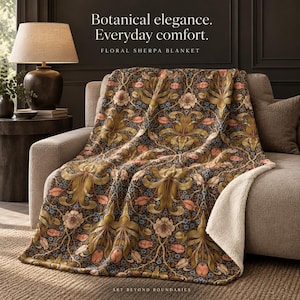 May include: A sherpa blanket featuring a dark brown background with a repeating floral pattern in shades of olive green, muted pink, and light blue. The text "Botanical elegance. Everyday comfort. FLORAL SHERPA BLANKET" is visible above the blanket.