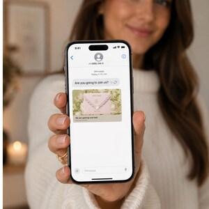 May include: A smartphone displaying an iMessage conversation. The screen shows the text 'Are you going to join us?' followed by a preview of a pink wedding invitation card featuring a floral design and the text 'We are getting married'.
