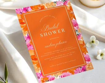 May include: An orange bridal shower invitation with floral accents. The invitation features the text "Bridal Shower" and the name "andrea johnson". The invitation is bordered by pink, orange, and yellow flowers.