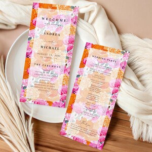 May include: Two rectangular wedding program cards featuring a vibrant floral border in shades of pink, orange, and yellow. The text includes 'WELCOME to the wedding of ANDREA and MICHAEL' and 'WEDDING PARTY' with lists of names and ceremony details.