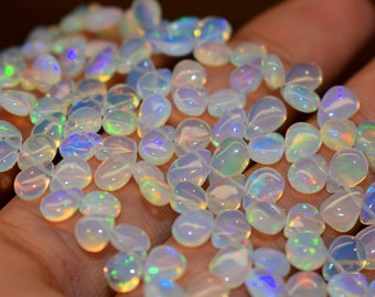 AAA Ethiopian Opal Pear Beads: Smooth Fire Opal Drops (5x7-7x9mm)