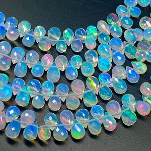 AAA Ethiopian Opal Teardrop Beads: Smooth Faceted Pear Shape, 4x5-8x10 mm