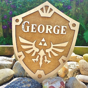 Bouclier d'Hyrule avec nom, Bouclier d'Hyrule, Bouclier Zelda en bois, personnalisé, Bouclier d'Hyrule avec nom, Bouclier Zelda personnalisé. Cadeau Zelda