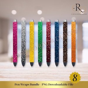 May include: A set of eight glitter pen wraps in various colors, including pink, silver, yellow, green, red, blue, brown, and orange. The pen wraps are arranged in a row on a wooden surface. Pen Wraps Bundle - PNG Downloadable File.