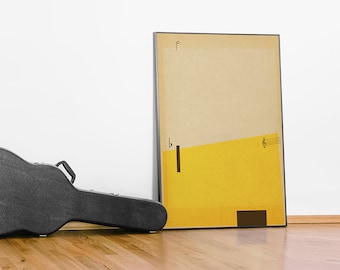 May include: A black guitar case rests on a wooden floor next to a framed abstract art print. The print features a beige background with a yellow geometric shape and musical notation. The frame is black.