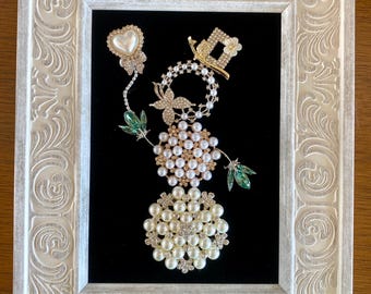 Sparkling, whimsical jewelry art snowman with heart shaped balloon framed 5”x7”