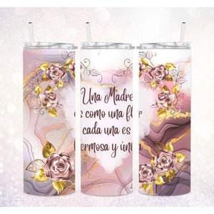 May include: Three stainless steel tumblers with a pink and gold marble design and gold leaf accents. Each tumbler features a rose with gold leaves and the text "Una Madre es como una flor, cada una es hermosa y única".
