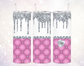 May include: Three stainless steel tumblers with a pink quilted design and silver glitter dripping down the sides. The center tumbler has a silver heart charm hanging from it.