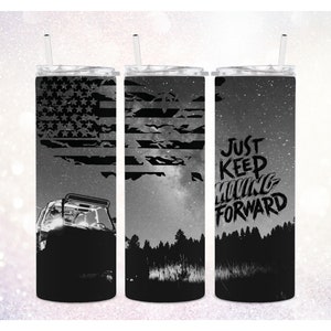 May include: Three black and white tumbler cups with different designs. The first cup features a distressed American flag with a silhouette of a car in the foreground. The second cup features a distressed American flag with a silhouette of a forest in the foreground. The third cup features a starry night sky with a silhouette of a forest in the foreground and the text "Just Keep Moving Forward".