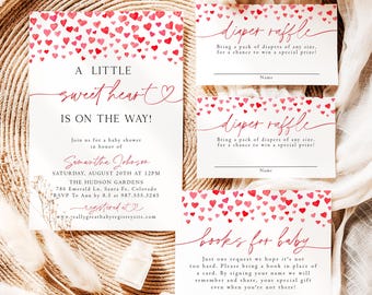 May include: A baby shower invitation set featuring red and pink watercolor hearts. The main card reads A LITTLE sweet heart IS ON THE WAY! with event details. Two diaper raffle cards and one books for baby card are included in the set.