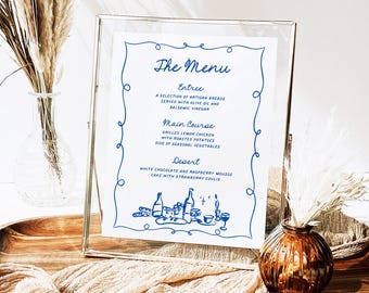 May include: A white menu with blue text and illustrations. The menu lists the entree, main course, and dessert. The entree is a selection of artisan breads served with olive oil and balsamic vinegar. The main course is grilled lemon chicken with roasted potatoes and seasonal vegetables. The dessert is white chocolate and raspberry mousse cake with strawberry coulis.