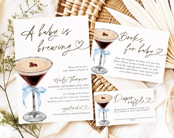 May include: A set of three white paper cards for a baby shower featuring watercolor illustrations of espresso martinis with light blue ribbons. The text includes A baby is brewing, Books for baby, and Diaper raffle with event details.