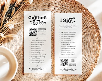 Può includere: Due cartoncini rettangolari bianchi per attività di matrimonio con testo e grafica neri. Il cartoncino a sinistra riporta Capture the love con un codice QR e un elenco. Il cartoncino a destra riporta I Spy con un elenco e un codice QR.
