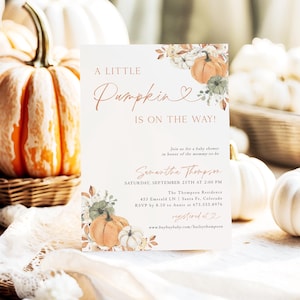 May include: A baby shower invitation with the text "A Little Pumpkin Is On The Way!" features watercolor pumpkins and floral accents. The invitation includes event details and RSVP information, with pumpkins and gourds in the background.