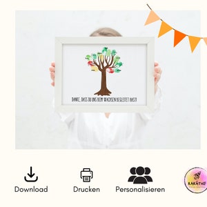 May include: A framed print with a watercolor tree with colorful handprints on the leaves. The text below the tree reads "Danke, dass du uns beim wachsen begleitet hast!"