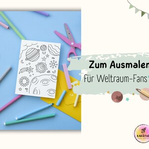 May include: A black and white coloring page featuring a variety of space-themed illustrations, including planets, stars, a comet, and a moon. The page is surrounded by colorful markers, crayons, and scissors on a light blue background. The text "Zum Ausmalen F&uuml;r Weltraum-Fans*" is visible in the image.