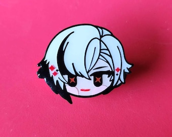 May include: A white and black enamel pin featuring a stylized anime character's face. The character has white hair, red accents, and a small red mouth. The pin is set against a bright pink background.