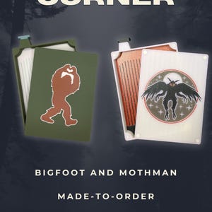 May include: Two rectangular bead sorting trays with lids. One olive green tray features a brown Bigfoot silhouette. The other translucent white tray displays a circular graphic of a black Mothman with red eyes against a starry background. Text reads CRYPTID CORNER, BIGFOOT AND MOTHMAN, MADE-TO-ORDER.