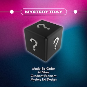 May include: A white ceramic mug with a black handle and the text "But First, Coffee" in a bold, black font. The mug is set against a blurred background, suggesting a cozy setting.