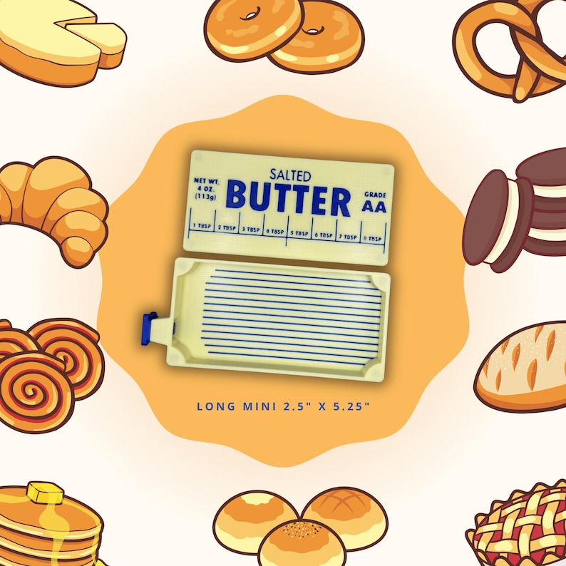 May include: A cartoon image of a butter dish with the words "Salted Butter" and measurement markings. The butter dish is 6.35 cm by 13.34 cm. Various baked goods, including donuts, croissants, and bread, surround the butter dish.