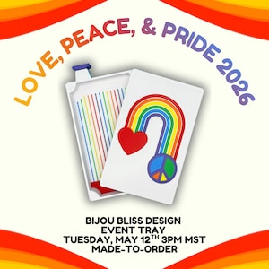 May include: A white event tray with a rainbow design, a red heart, and a peace symbol. The text "LOVE, PEACE, & PRIDE 2026" is displayed above the tray. The tray is made to order.