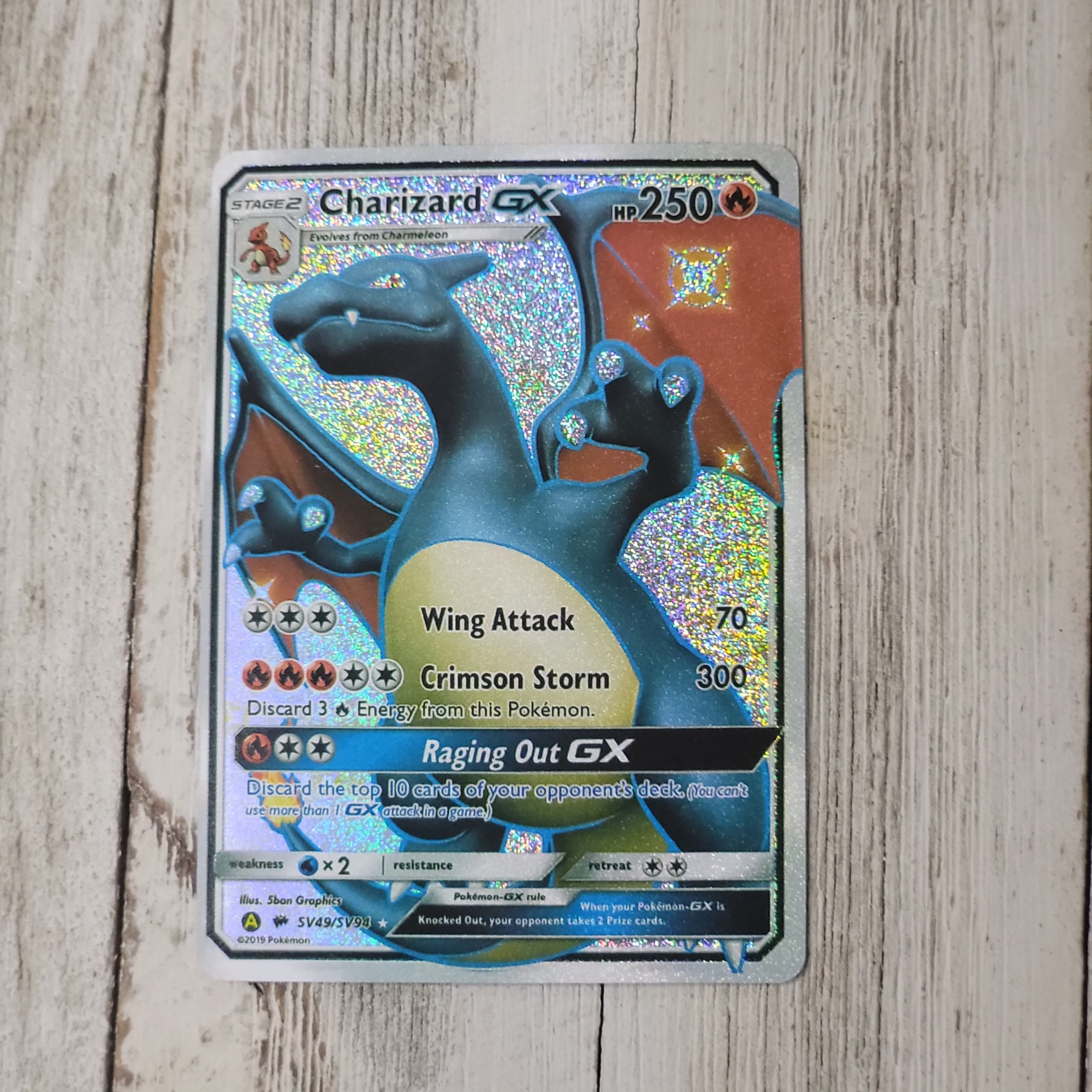 Rainbow charizard gx -  France