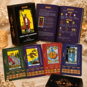 May include: A tarot deck and guidebook set titled "Tarot for Learning." The box is black with gold lettering and a central illustration. Several tarot cards are displayed, featuring colorful illustrations and titles like "The Empress" and "The Fool."