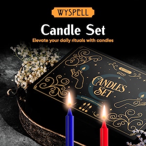 May include: A candle set with a black box featuring gold accents and the words "Candle Set". Two lit candles, one blue and one red, are in front of the box. The image also includes the text "Elevate your daily rituals with candles".