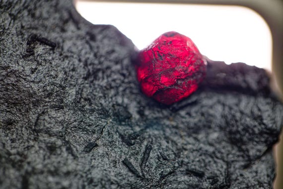 Almandine Garnet with Graphite and Dravite, view 10