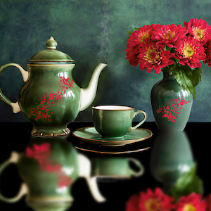 May include: A green teapot with red floral designs, a green teacup and saucer, and a green vase with red flowers on a black surface.