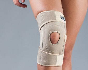 LOREY - Neoprene knee brace with integrated silicone ring and patella recess