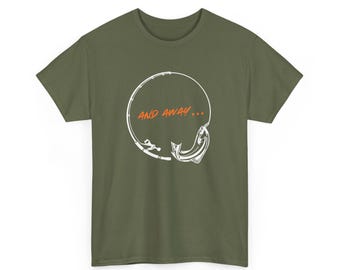 May include: Olive green t-shirt featuring a white graphic of a fishing rod, a fish, and the text "AND AWAY...". The design is enclosed in a white circle. A casual tee for fishing enthusiasts.