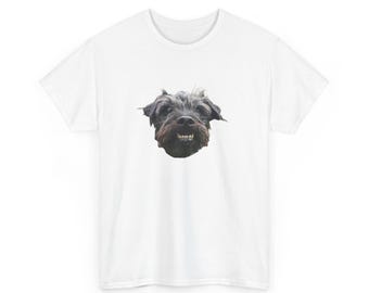 May include: White t-shirt featuring a close-up of a black and gray dog's face. The dog has a slightly open mouth, revealing its teeth. The shirt is made of a soft, lightweight material.
