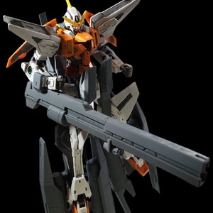 May include: A detailed model of a white, orange, and gray robot with a large gun. The robot has a yellow crest on its head and is posed in a dynamic action pose. #emodelworkshop