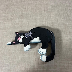 Holztür Topper mit schlafender Katze
