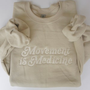 Movement is Medicine Embroidered Crewneck Sweatshirt
