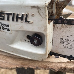Artisanal chainsaw bar nuts stihl chain saw forestry arborist blued nut bluenuts made in USA tree cutting saw chain wood carving firewood