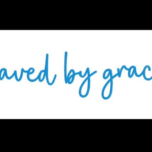 May include: Blue cursive text on a white background that reads "saved by grace".