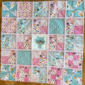 Handmade Baby Girl Pretty Kitty Cotton & Flannel Rag Quilt. Beautiful colors of Pink/Aqua with a beige backing. Adorable for the new baby!