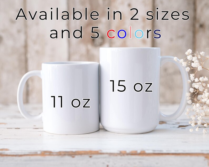 May include: Two white ceramic mugs, one labeled "11 oz" and the other "15 oz", are displayed. The text "Available in 2 sizes and 5 colors" is at the top. The mugs have large handles and are set against a light wood background.