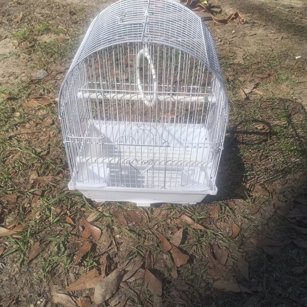 Illustration of Compact Bird Cage For Small Spaces