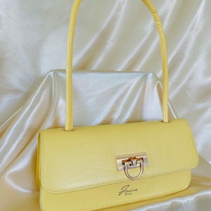 Bolso feroz amarillo