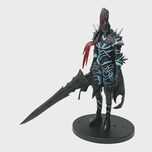 May include: A black action figure of a warrior in armor, holding a large sword. The figure has blue accents and red hair-like details. It stands on a black circular base, showcasing a detailed design.