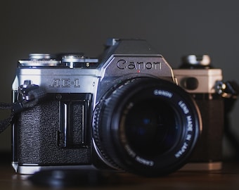 Canon Ae-1 with FD 50mm 1.4 and neck strap