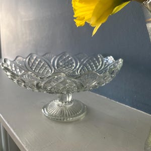 Pretty vintage glass cake stand on a decorative glass pedestal