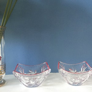 Pair of mid century glass bowls with ruby red rim